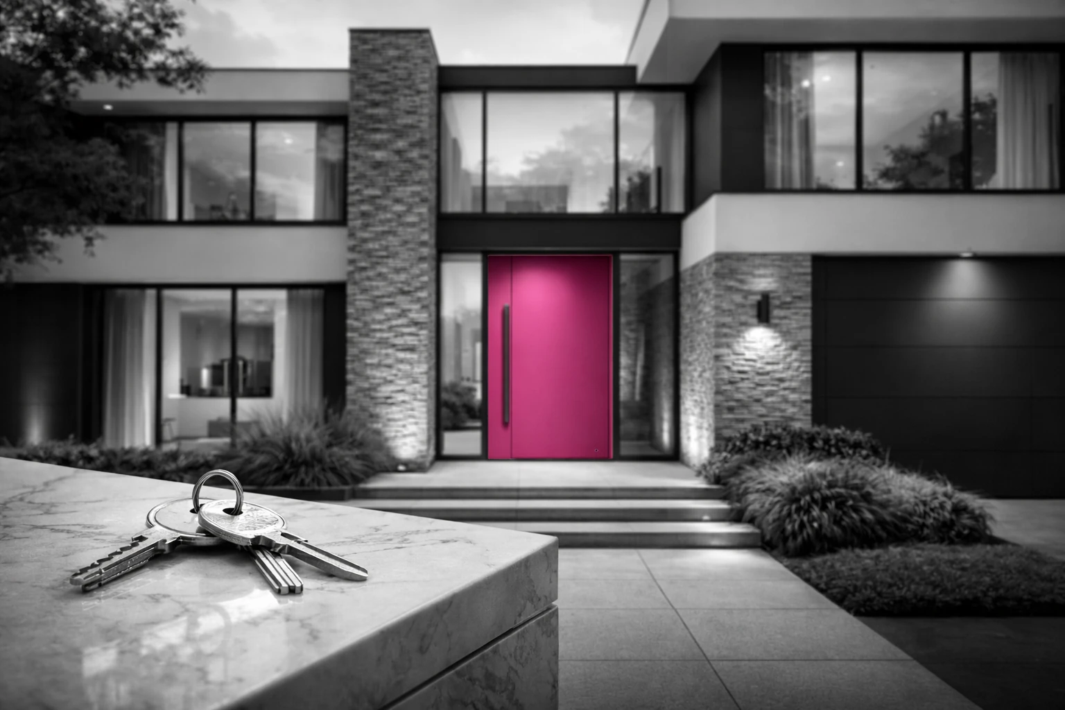 Clés devant une maison, pour un projet de rachat de part immobilière